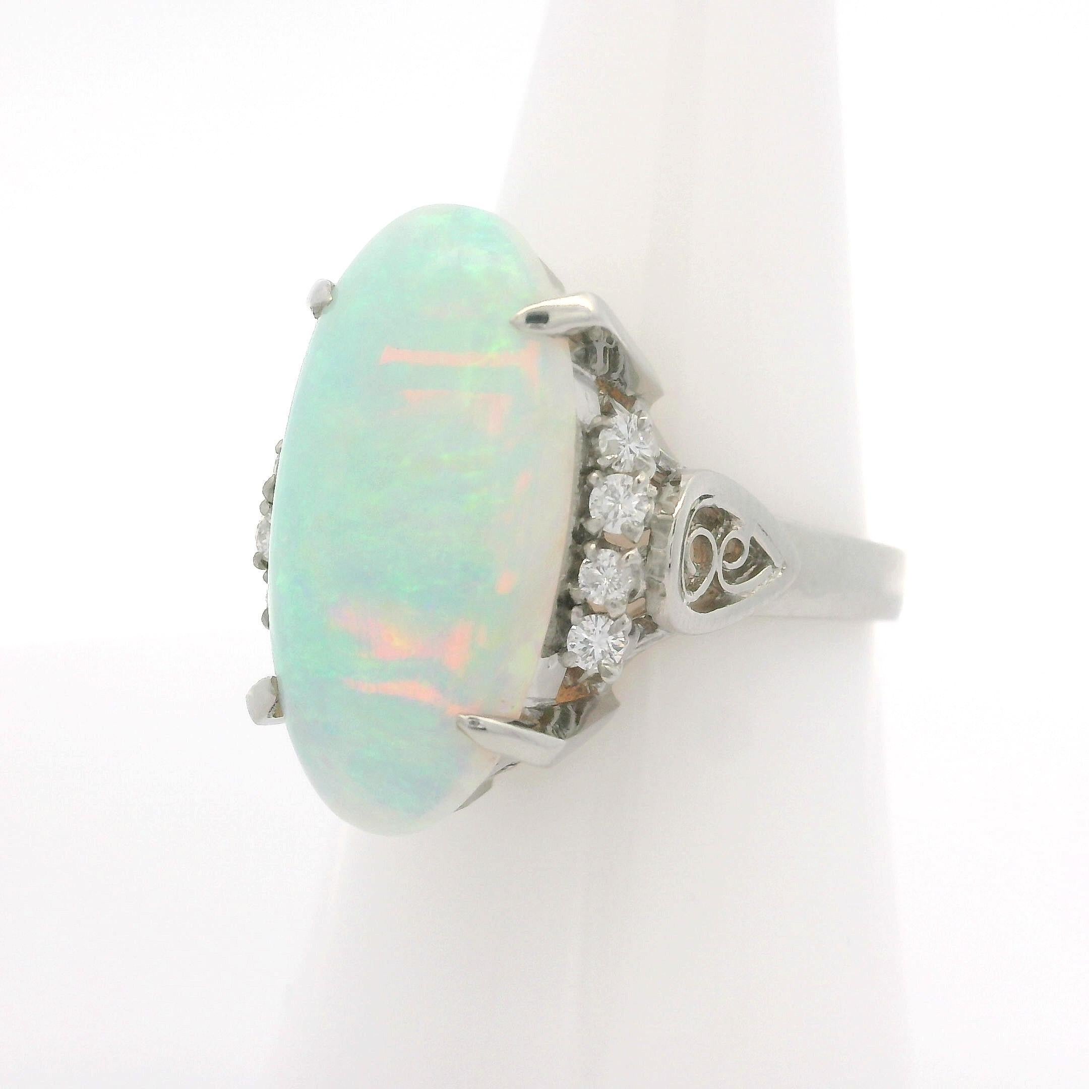 Vintage Platinum 4.59ctw Elongated Oval Opal & Diamond Cocktail Ring For Sale 8