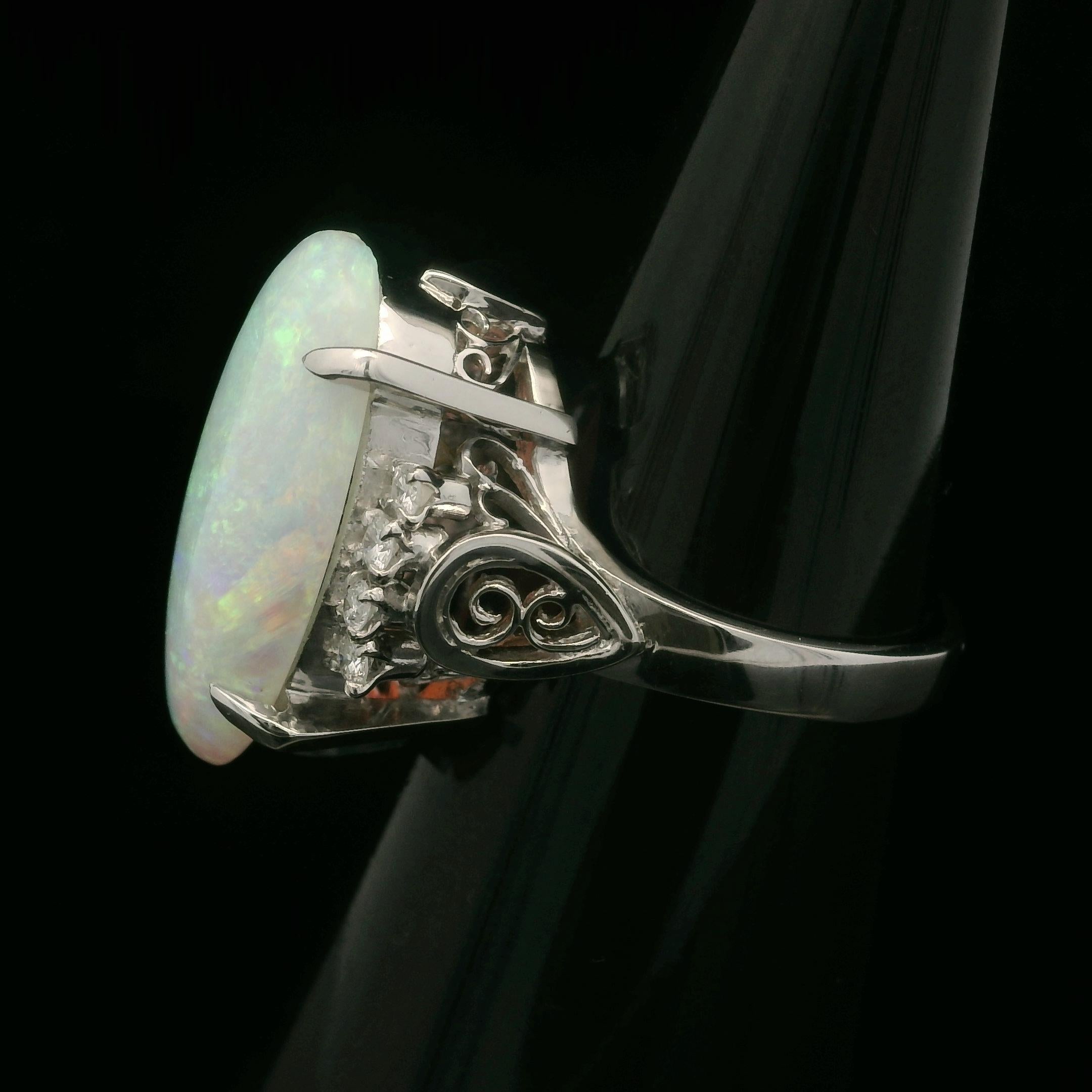 Vintage Platinum 4.59ctw Elongated Oval Opal & Diamond Cocktail Ring For Sale 2