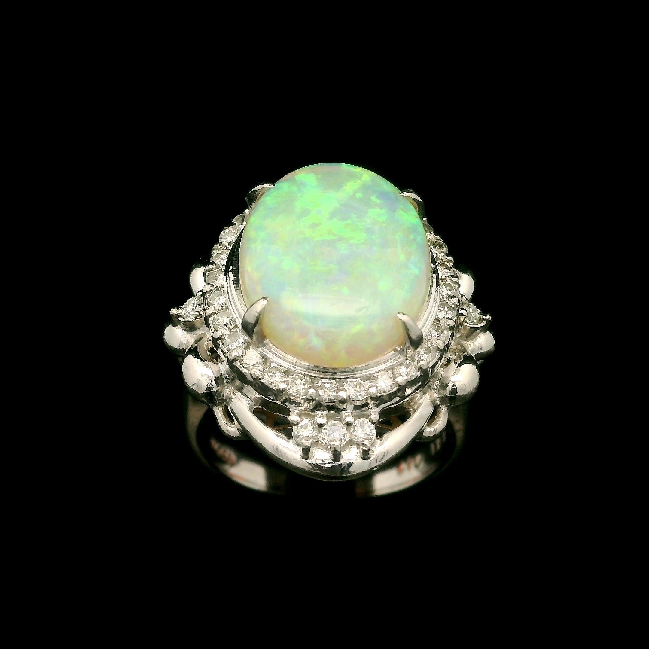 Vintage Platinum 4.88ctw Oval Opal & Diamond Halo Large Cocktail Ring In Good Condition For Sale In Montclair, NJ