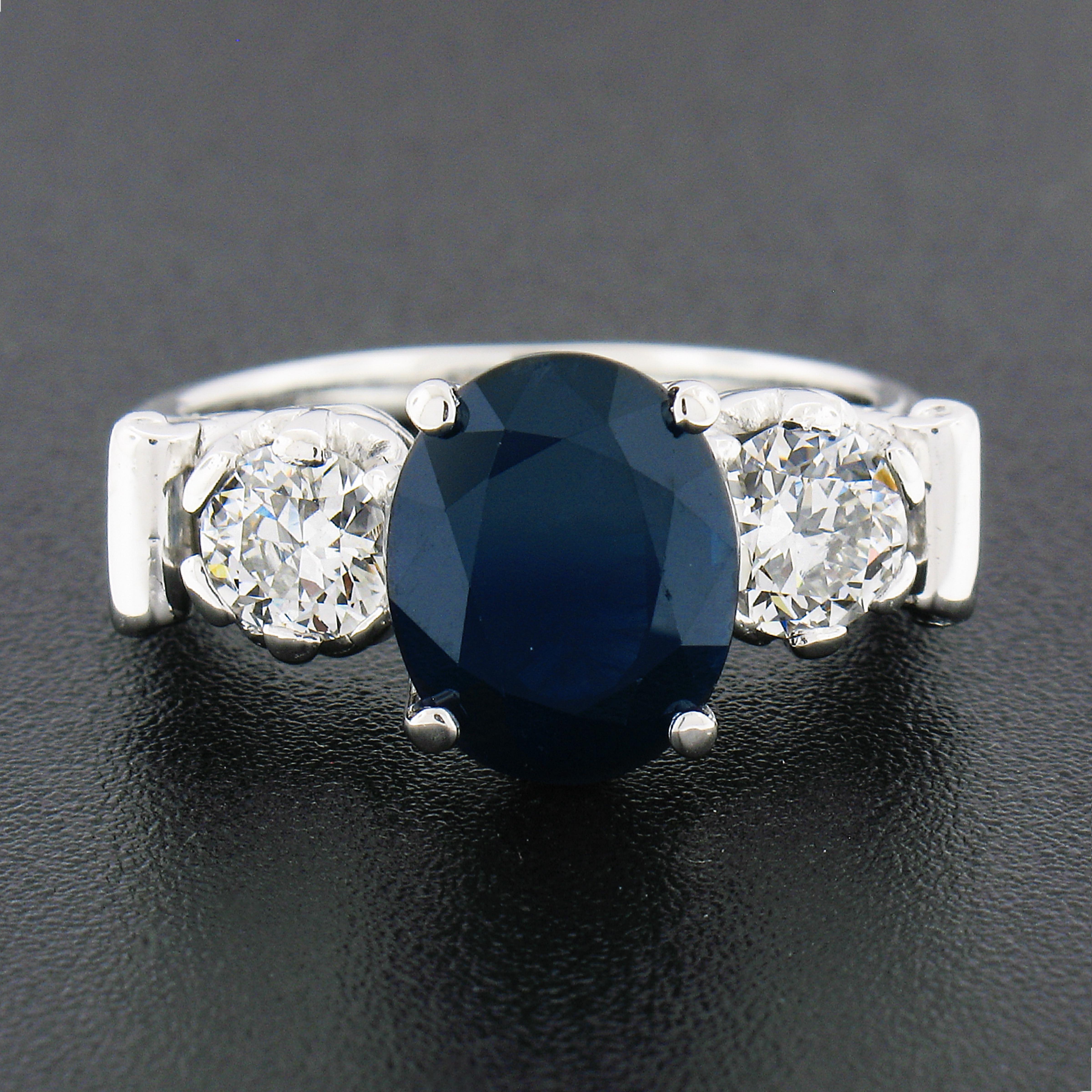 Oval Cut Vintage Platinum 4.95ct GIA Oval Dark Blue Sapphire w/ Old European Diamond Ring For Sale