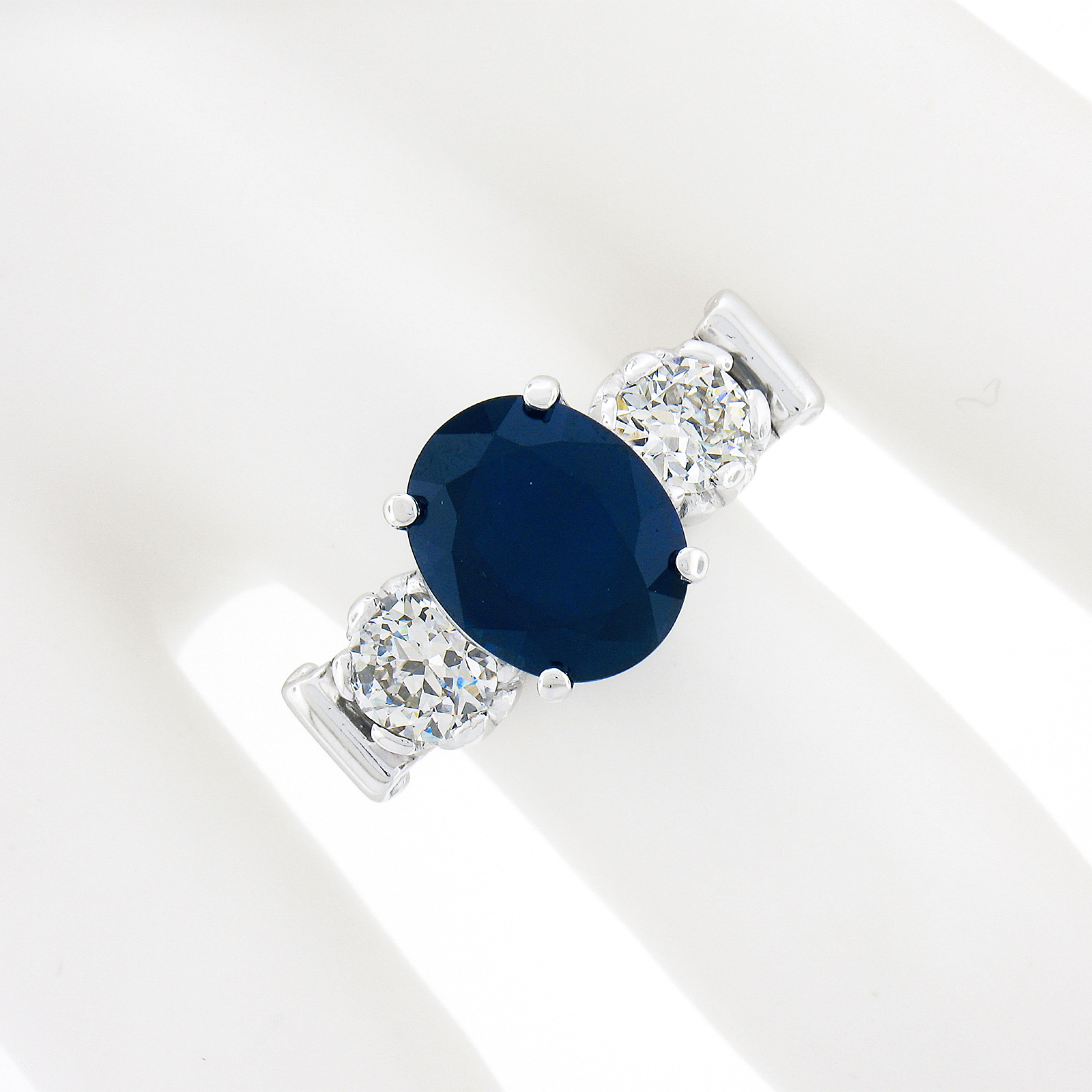 Vintage Platinum 4.95ct GIA Oval Dark Blue Sapphire w/ Old European Diamond Ring In Excellent Condition For Sale In Montclair, NJ