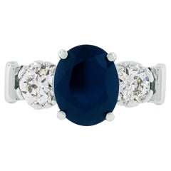 Bague vintage en platine avec saphir bleu foncé ovale de 4,95 carats certifié GIA et diamants d'Europe ancienne