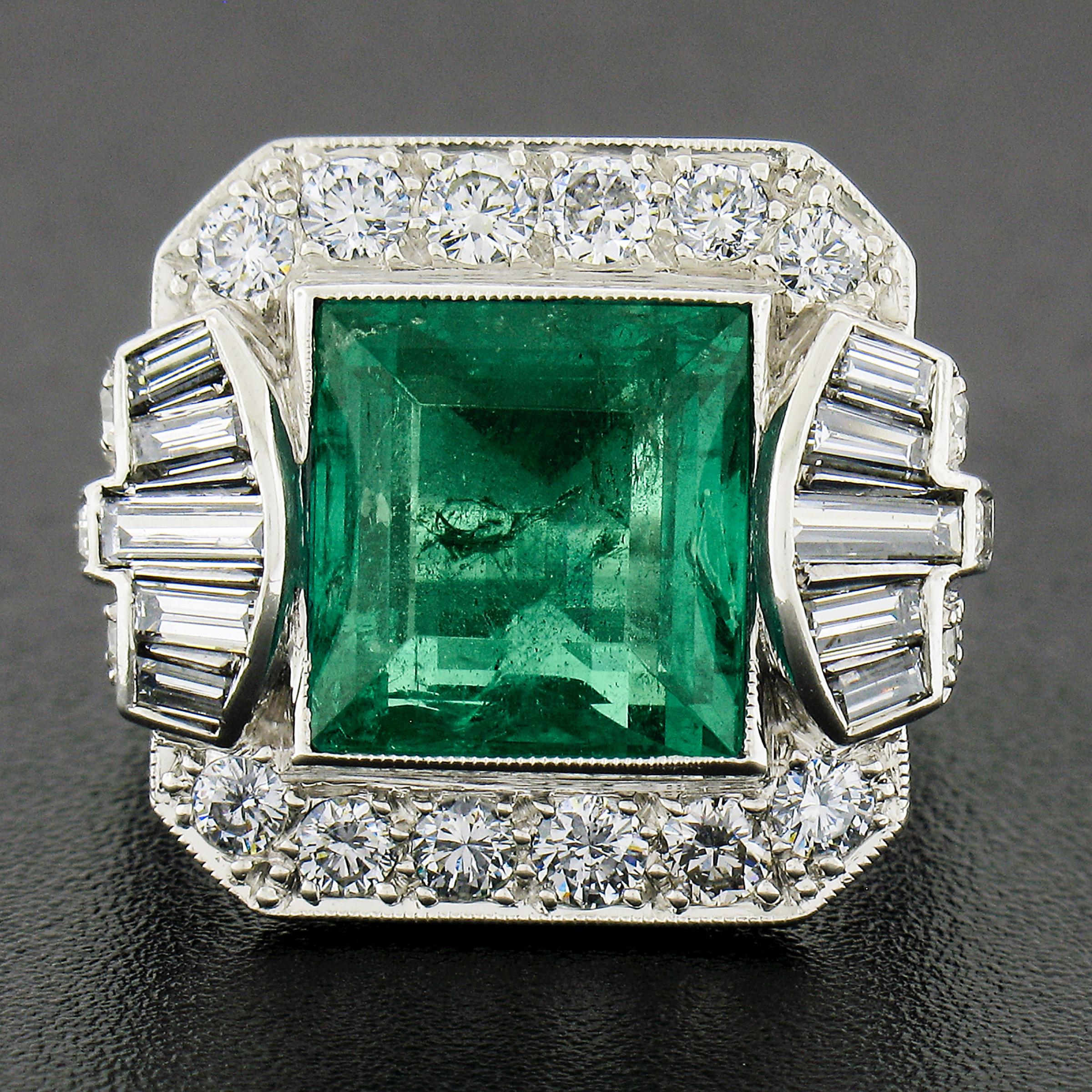 This breathtaking vintage emerald and diamond cocktail ring features a large, GIA certified, natural square step cut Colombian emerald neatly bezel set at the center, showing the most mesmerizing rich green color throughout. The emerald is graded by