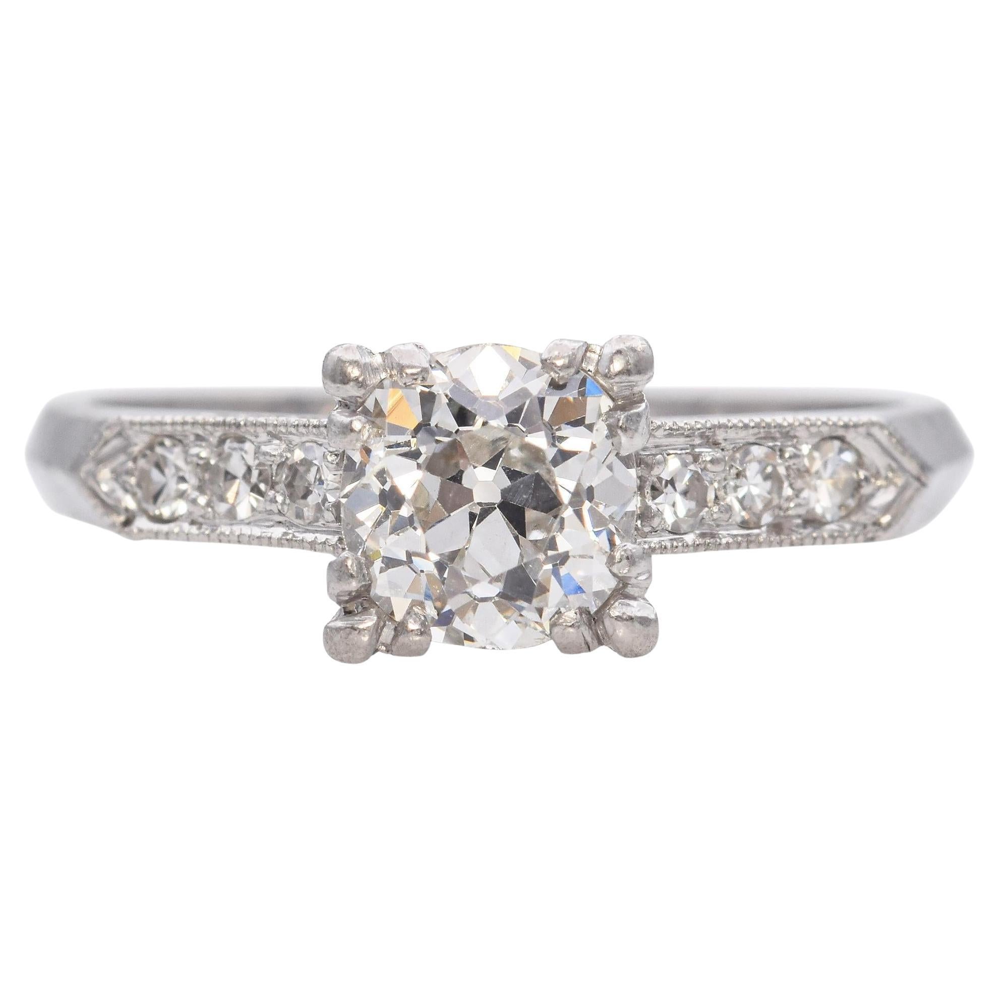 Bague de fiançailles vintage en platine avec un diamant de taille européenne de 0,60ct