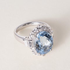 Vintage Platinum 6.47 Carat Oval Cut Aquamarine and Diamond Ring