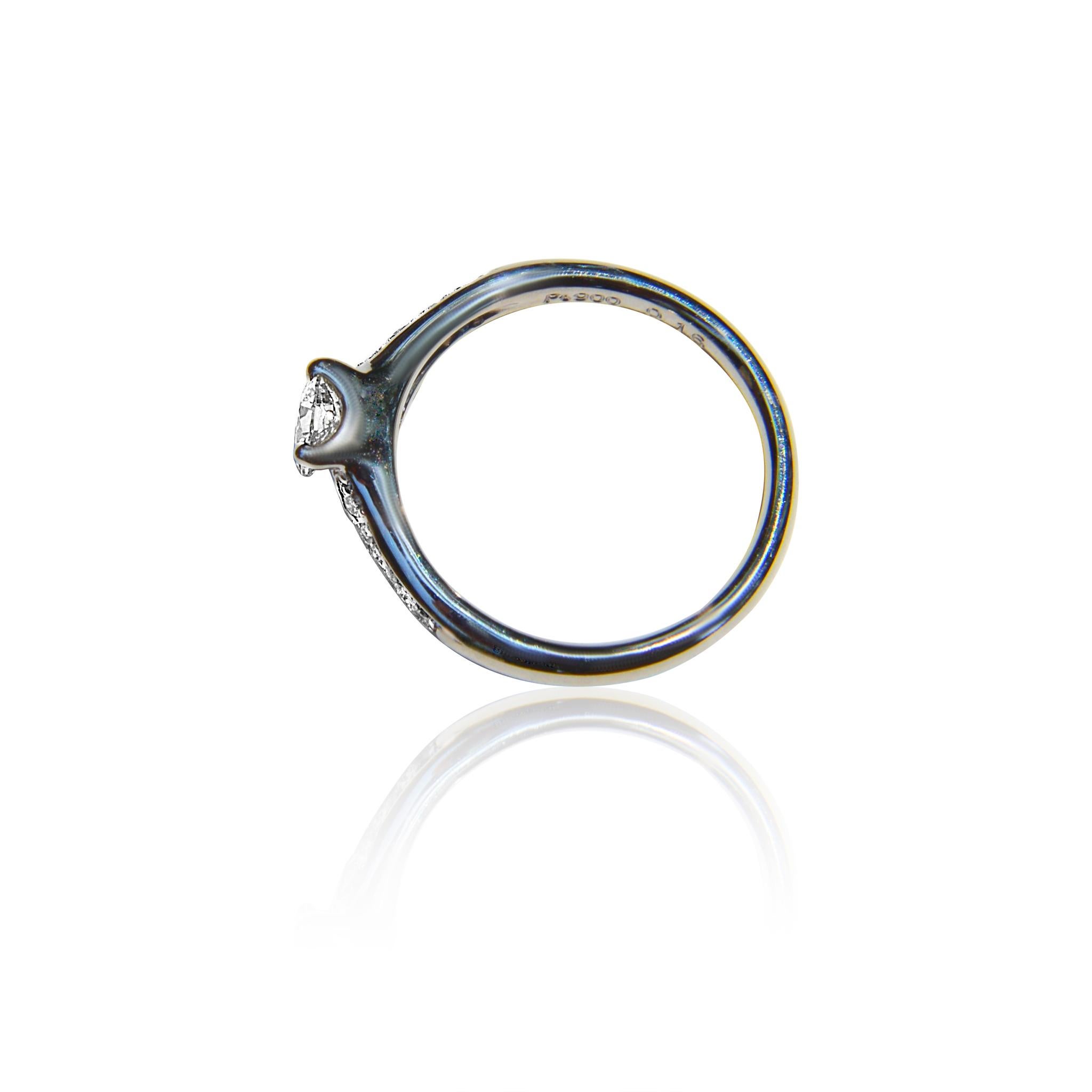 Women's or Men's Vintage Platinum .71 Carat Fancy Light Yellow Pear Diamond Engagement Ring For Sale