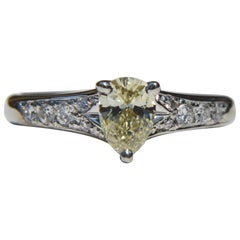 Vintage Platinum .71 Carat Fancy Light Yellow Pear Diamond Engagement Ring Vintage Platinum .71 Carat Fancy Light Yellow Pear Diamond Engagement Ring