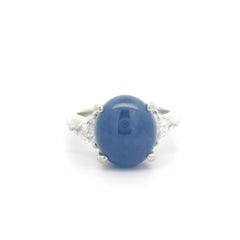 Anillo vintage de platino con zafiro estrella cabujón oval de 7,58 ctw y diamante trillón