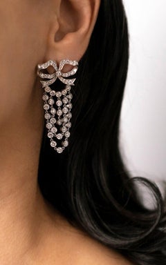 Vintage Platinum and 10 Carat Diamond Bow Drop Chandelier Earrings