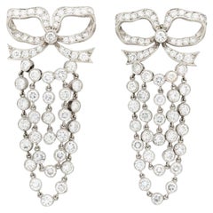 Vintage Platinum and 10 Carat Diamond Bow Drop Chandelier Earrings