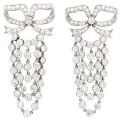 Vintage Platinum and 10 Carat Diamond Bow Drop Chandelier Earrings