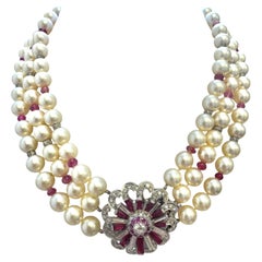 Vintage Platinum and 14K Gold Pearl Necklace with Ruby and Diamond Floral Clasp