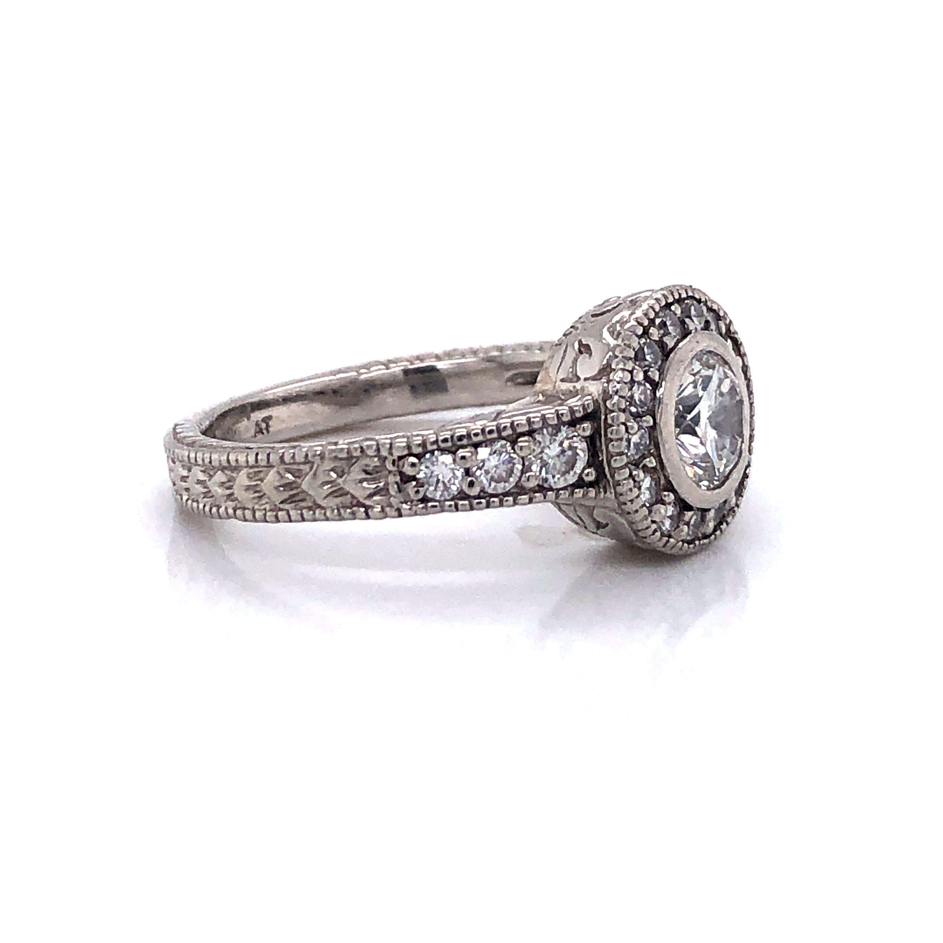 Vintage Platinum and .83cttw Diamond Halo Engagement Ring Size 5.75

Condition:  Very Good Condition
Metal:  Platinum (Marked, and Professionally Tested)
Weight:  7.4g
Center Diamond:  Round Cut .5ct
Center Diamond:  Color H
Center Diamond:  Clarity