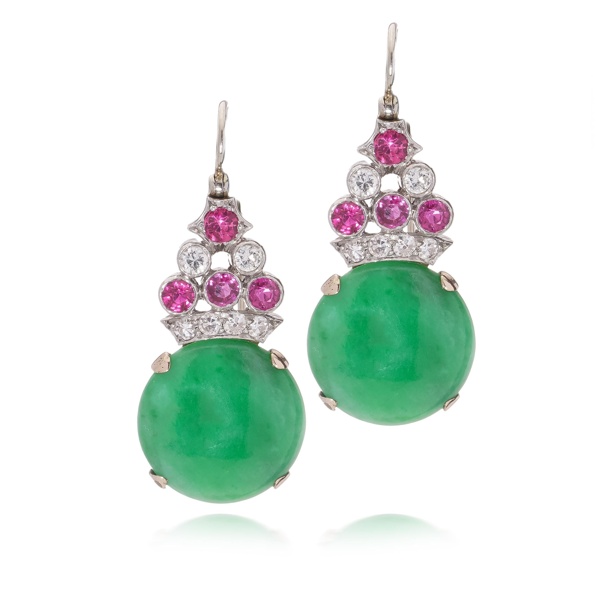 Vintage Platinum and 9kt. gold hook earrings with Jadeite, diamonds, and rubies. 
X-Ray has been tested positive for platinum and 9kt. gold. 

Dimensions:
Length x width x depth: 3.2 x 1.5 x 1.2 cm
Weight: 6.61 grams 

Jadeite -Quantity of