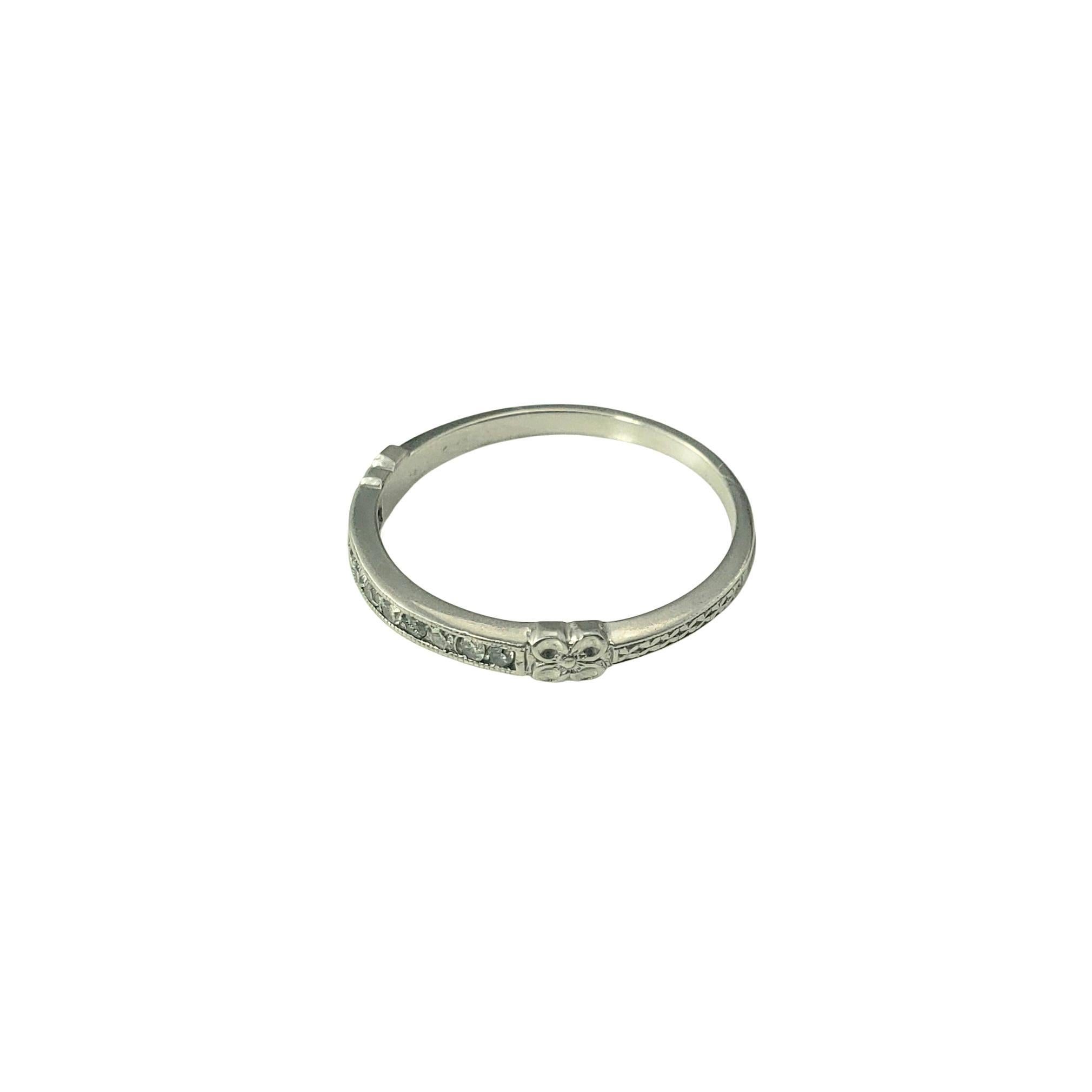 Vintage Platinum and Diamond Band Ring Size 5.5

Delicate and refined, this vintage platinum band features 10 sparkling single-cut diamonds set in a beautifully detailed platinum. A graceful piece with heirloom appeal; ideal for those who appreciate