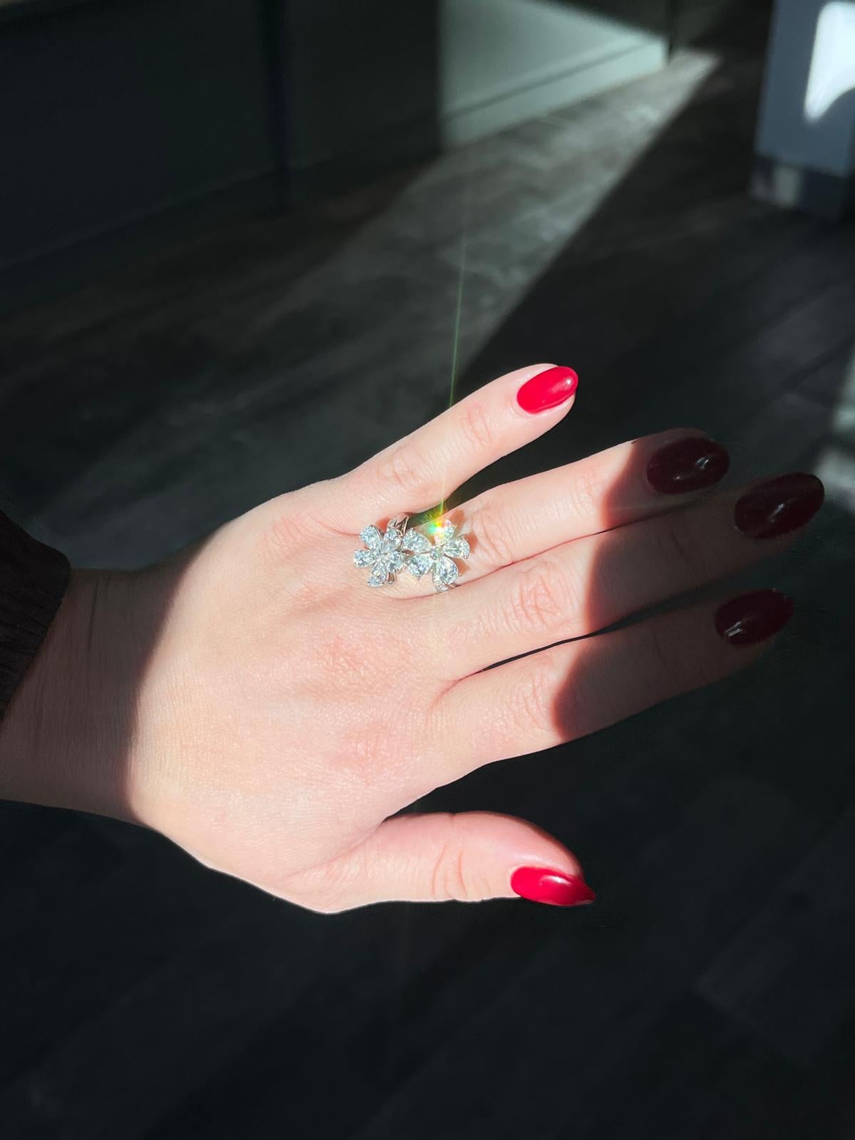 Vintage Platinum and Diamond Floral Bypass Ring In Good Condition For Sale In Princeton, NJ