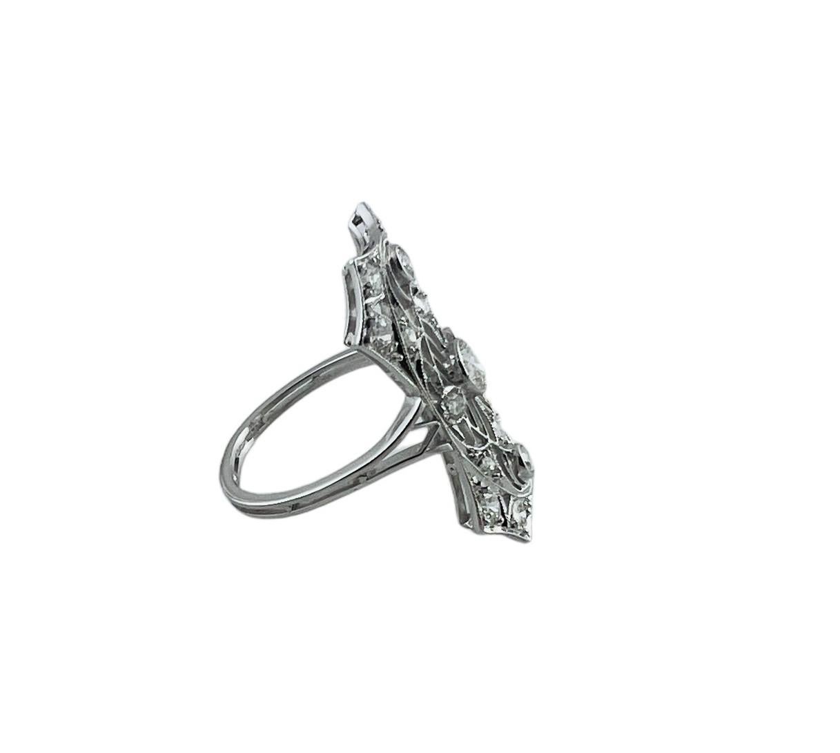 Vintage Platinum and Diamond Ring Size 6.5-

This lovely ring features 14 round brilliant cut diamonds and five old mine cut diamonds set in beautifully detailed platinum.  Top of ring measures 25 mm x 15 mm. Shank measures 1.5 mm.

Total diamond