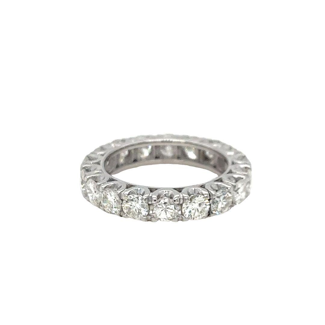 Round Cut Vintage platinum and round diamond eternity band For Sale