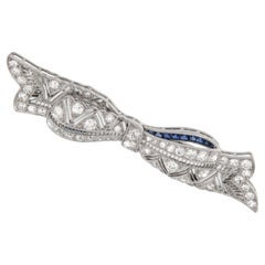 Antique Platinum Art Deco 1.50 Cttw Diamond 0.45 Cttw Sapphire Bow Pin Pendant 