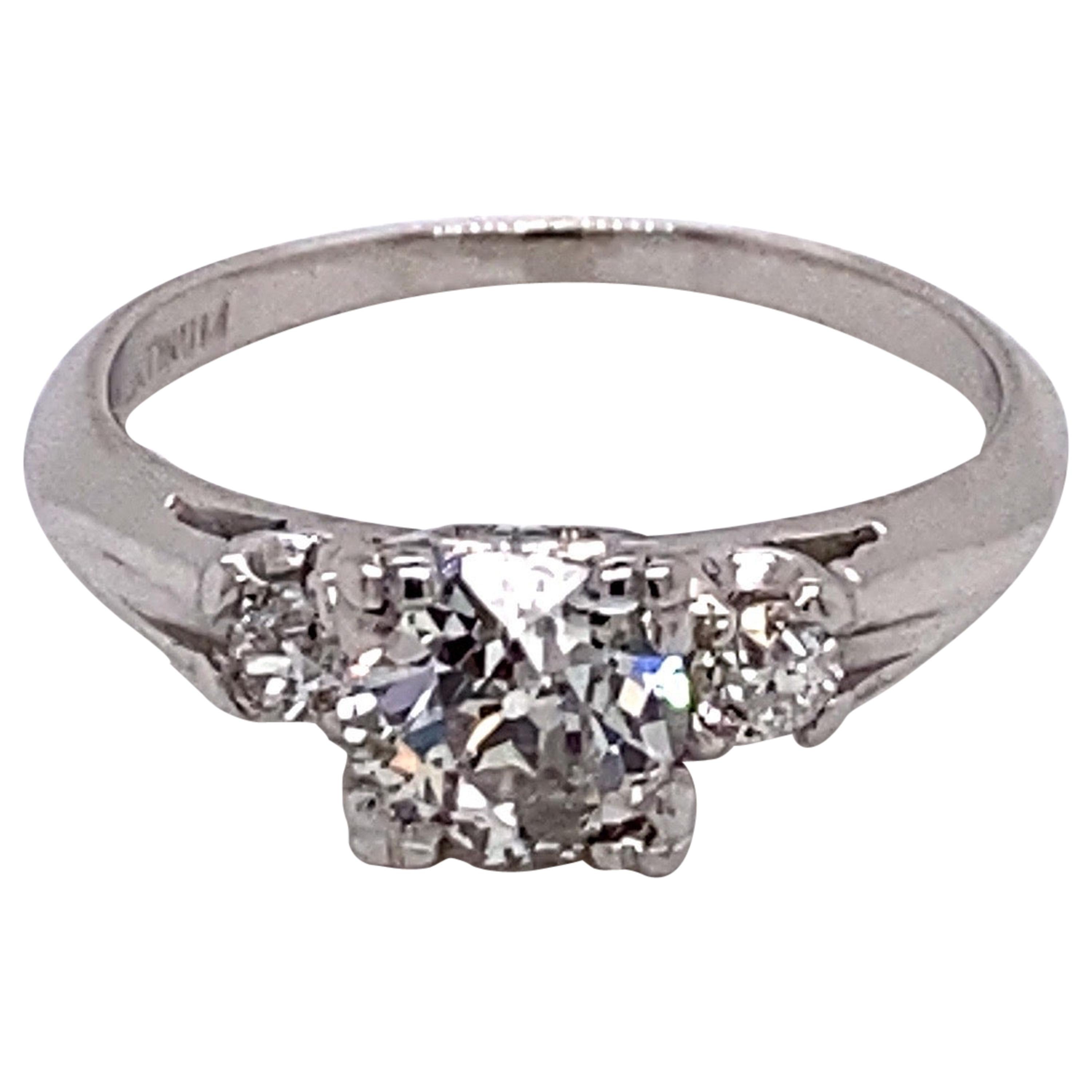 Vintage Platinum Art Deco 3-Stone Diamond Ring .84 Carat and .15 Carat For Sale