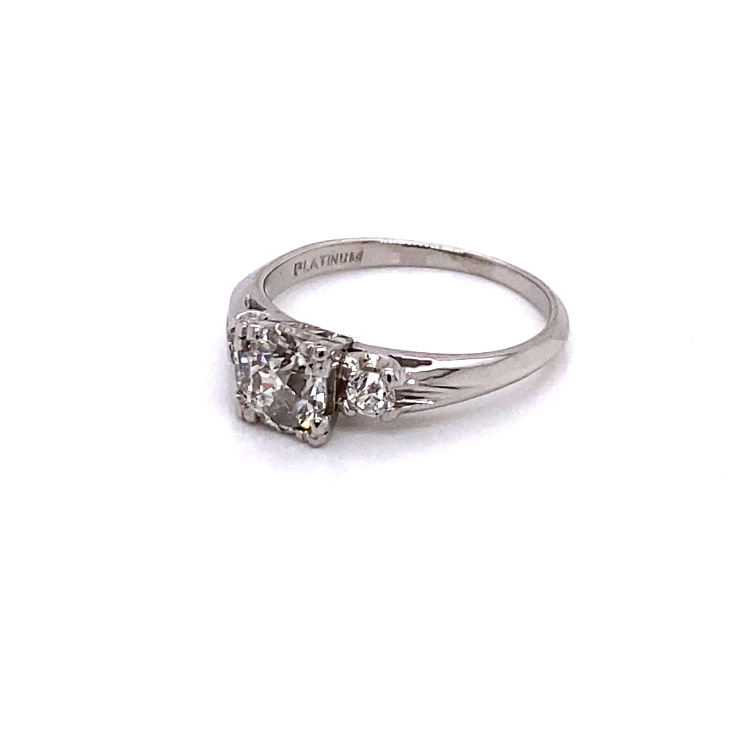 Art déco Vintage Platinum Art Deco 3-Stone Diamond Ring .84 Carat and .15 Carat en vente