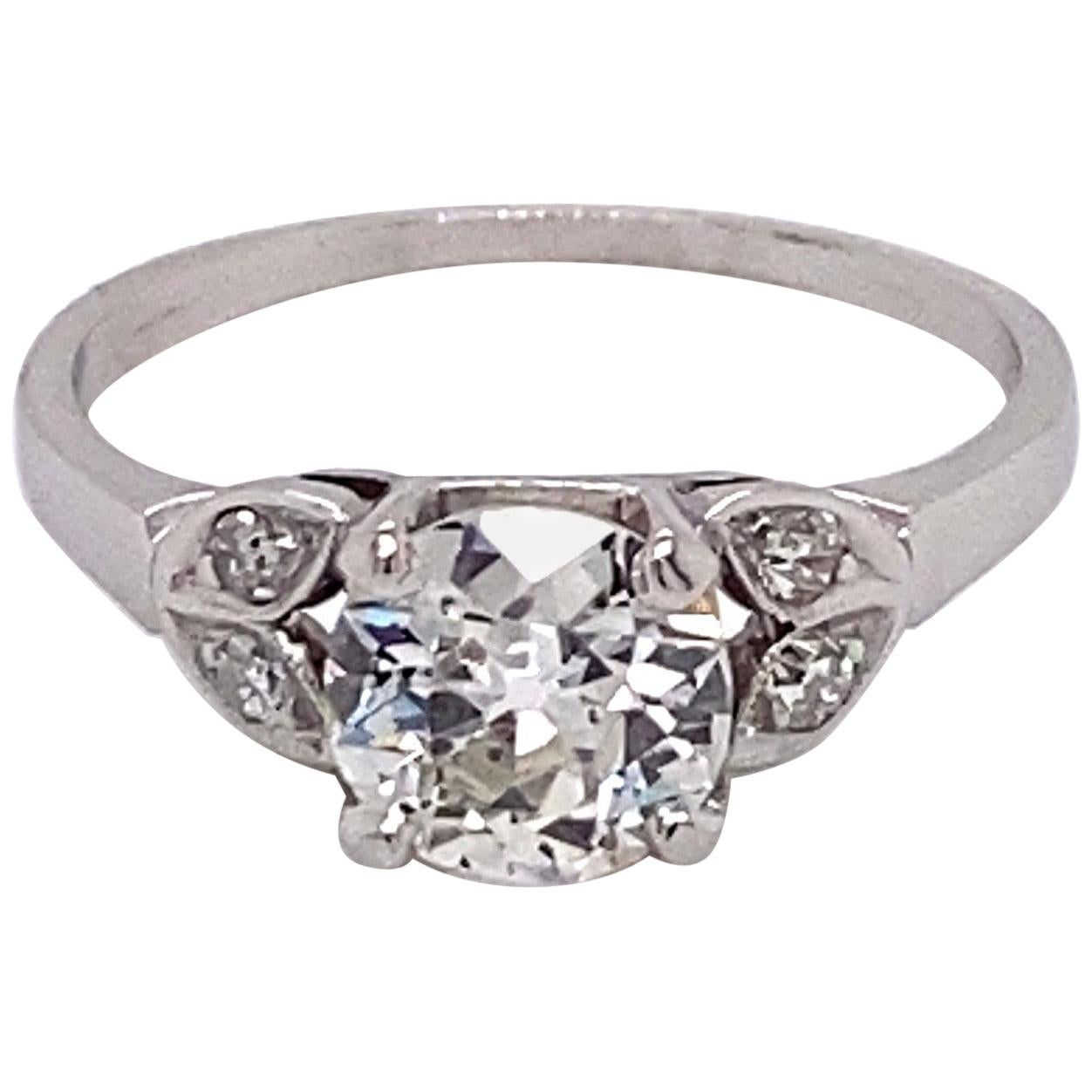 Vintage Platinum Art Deco Diamond Engagement Ring 1.01 Carat with Diamond Leafs For Sale