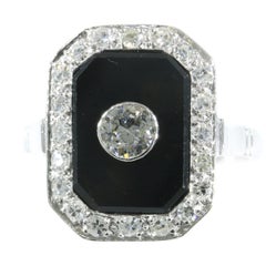 Vintage Platinum Art Deco Style Diamond and Onyx Ring from the 1950s