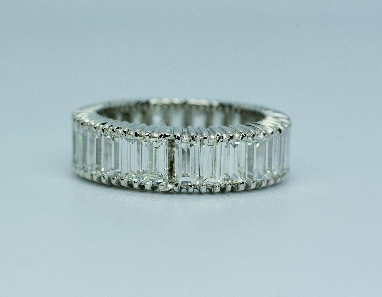 Platinum Baguette Cut Diamond Eternity Band
Baguette Cut White Diamonds
Size 5.25
3 Carats Total Weight
Color: D-F Clarity: Vs1-VS2
This is a beautiful Ring that showcases these flawless baguette cut white diamonds. There is one spot where there is