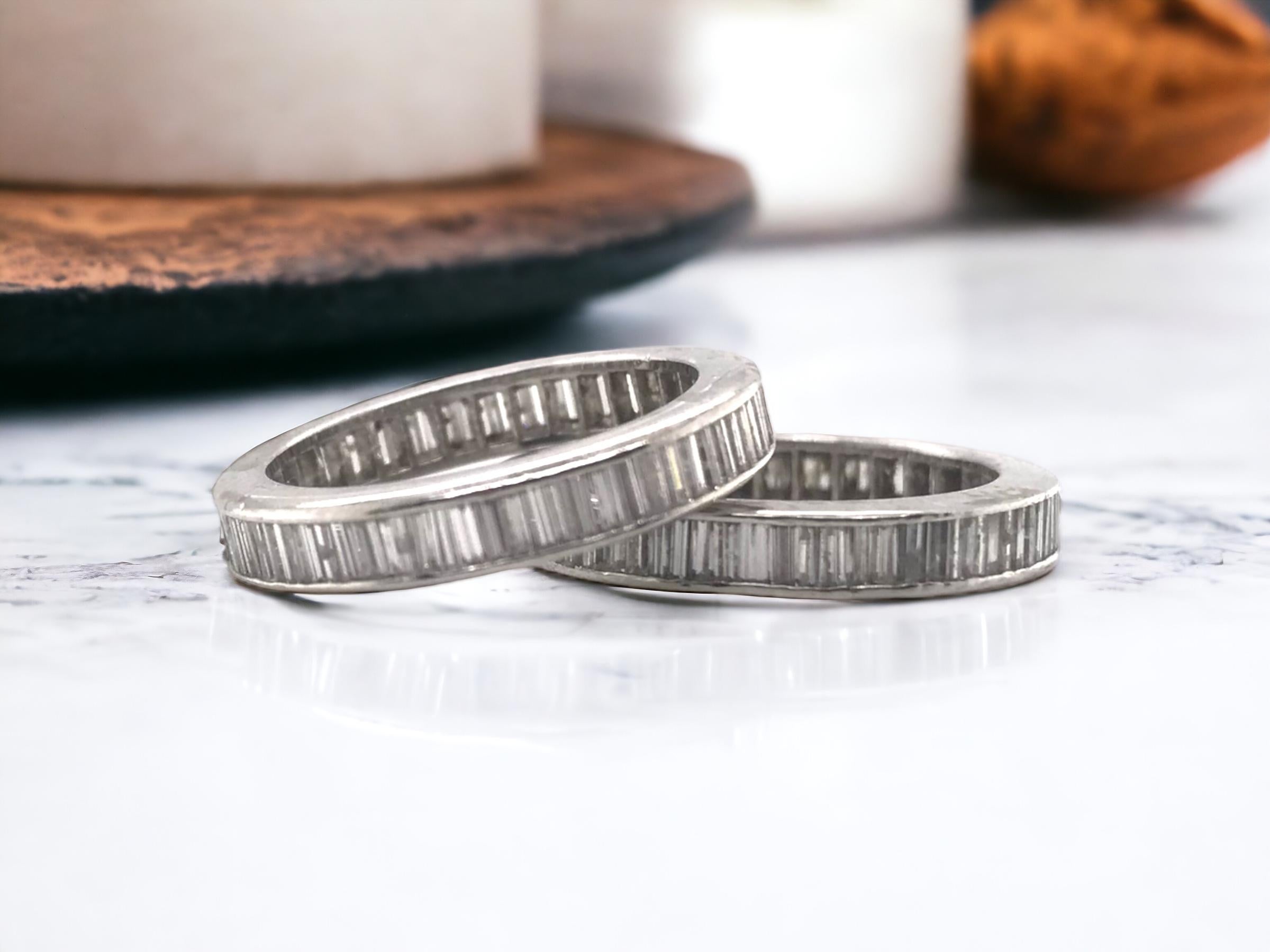 We are excited to offer these lovely bands!
We rarely get to buy vintage matching eternity bands like these.
They are available as a pair or separately, priced  & listed individually.

Band Details
Material: Platinum
Width: 3.5mm
Size: 5 3/4