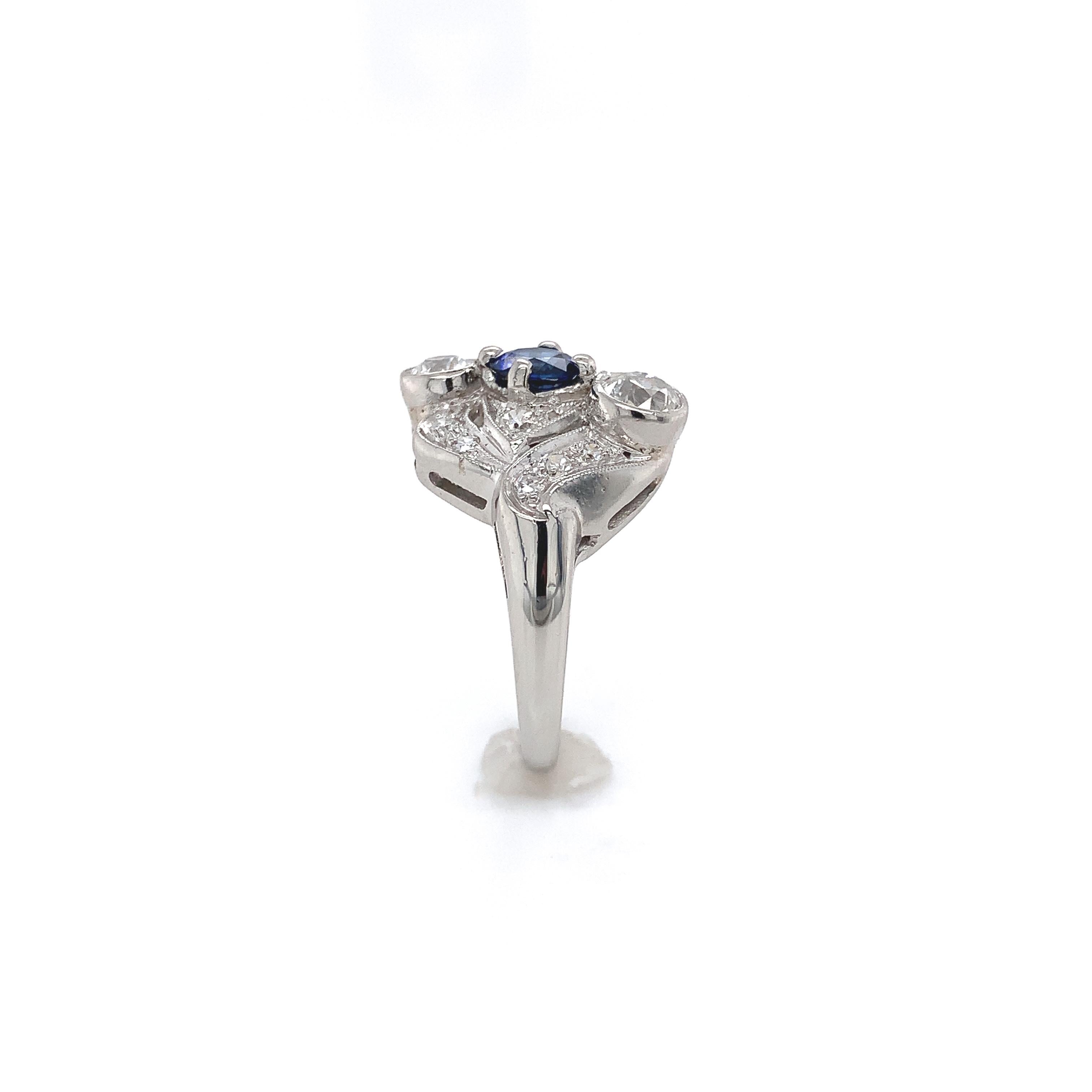 Round Cut Vintage Platinum Blue Sapphire and Diamond Ring For Sale