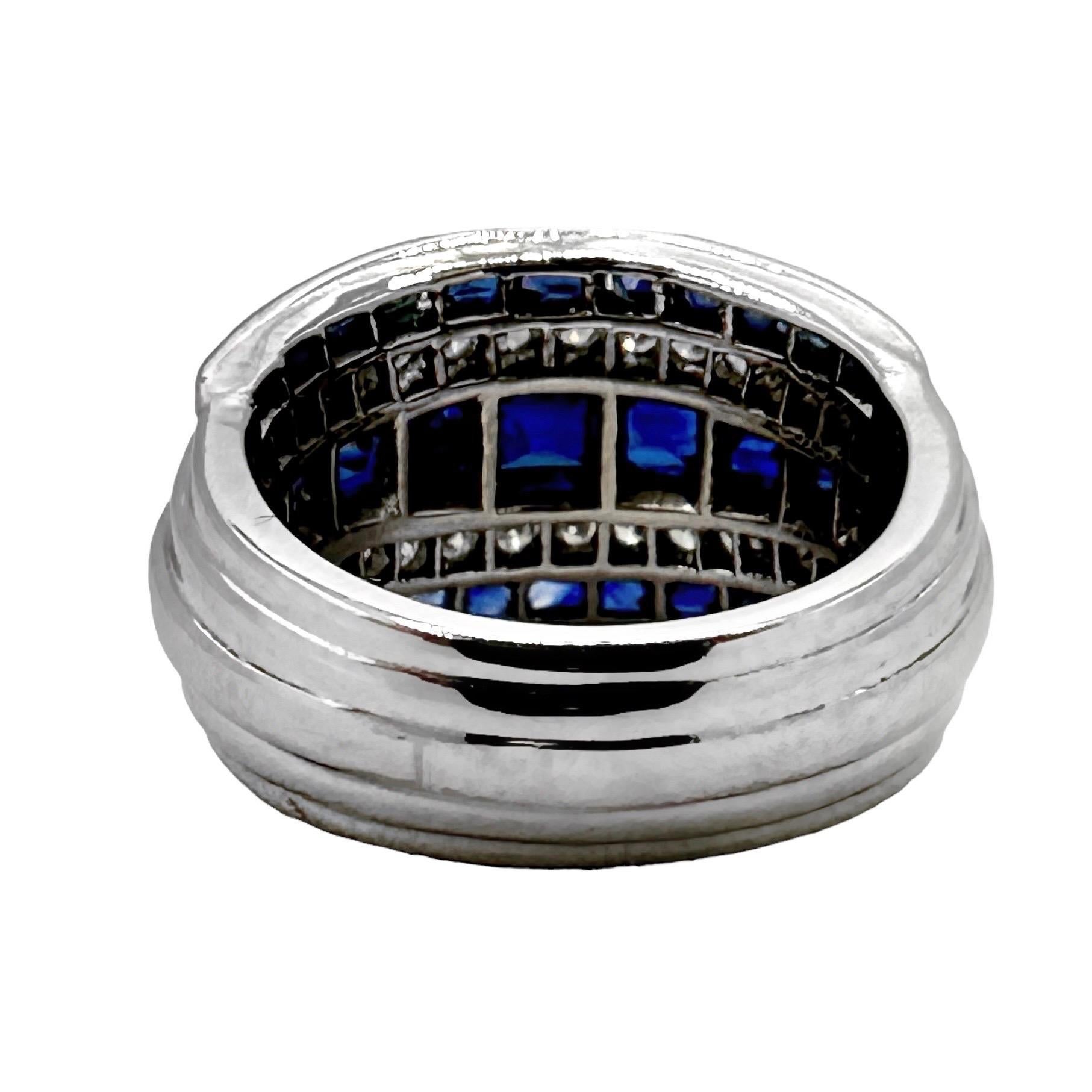 Round Cut Vintage Platinum Calibre Cut Sapphire and Diamond Slightly Domed Band Ring For Sale