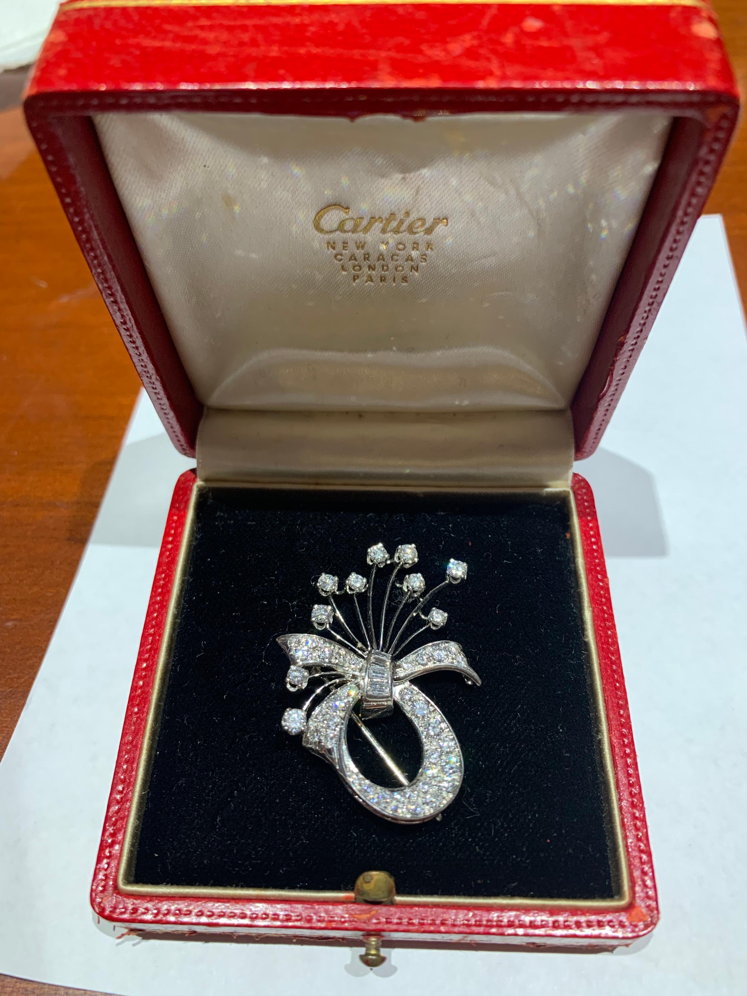Vintage Cartier Platinum Brooch with approximately 3.50 carats of round and baguette diamonds.