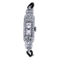 Bracelet montre-bracelet vintage en platine avec 17 diamants et acoro, en parfait état de fonctionnement