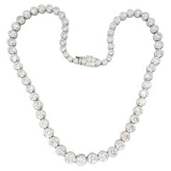 Collier ras du cou tennis vintage en platine avec diamants 28 carats poids total. 