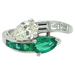 Vintage Platinum Diamond and Emerald Ring Wedding Ring By Pass Ring.