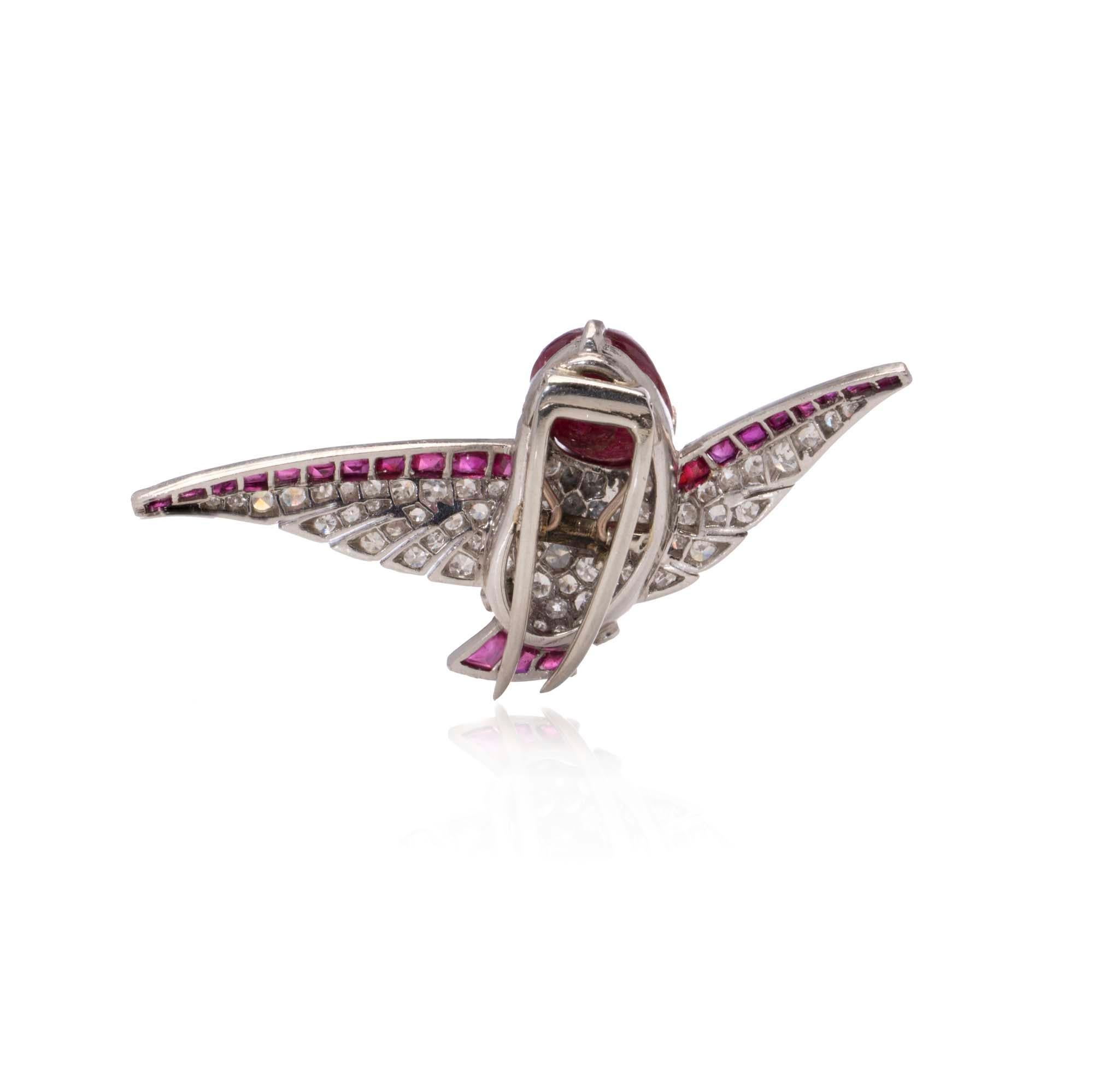 Women's Vintage platinum diamond and ruby humming bird brooch. For Sale