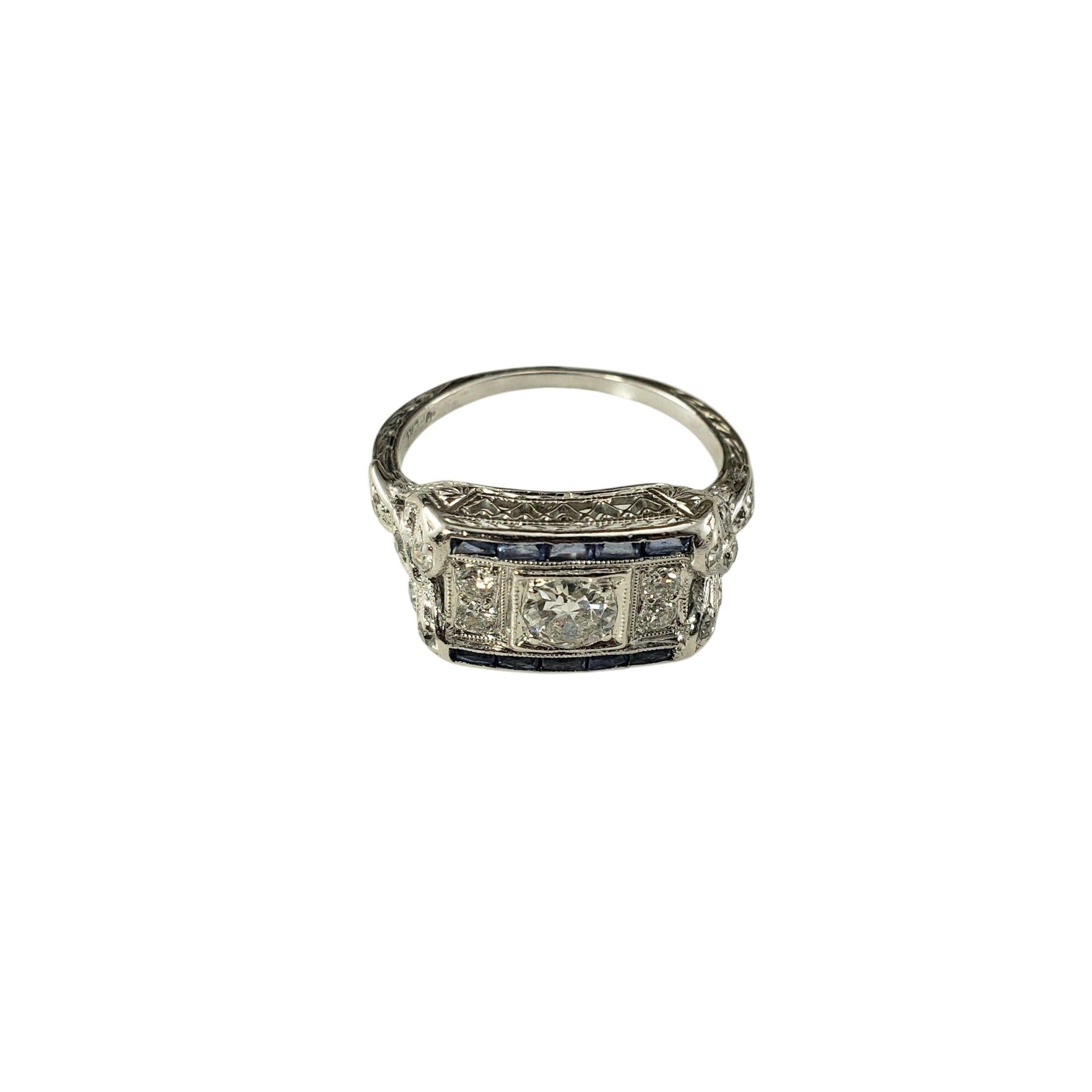 Vintage Platinum Diamond and Sapphire Ring Size 4.25-4.5

A bold and elegant design in classic platinum, this ring features a old cut round center diamond (approximately .25 ct.) framed by additional round single cut accent diamonds with a border of