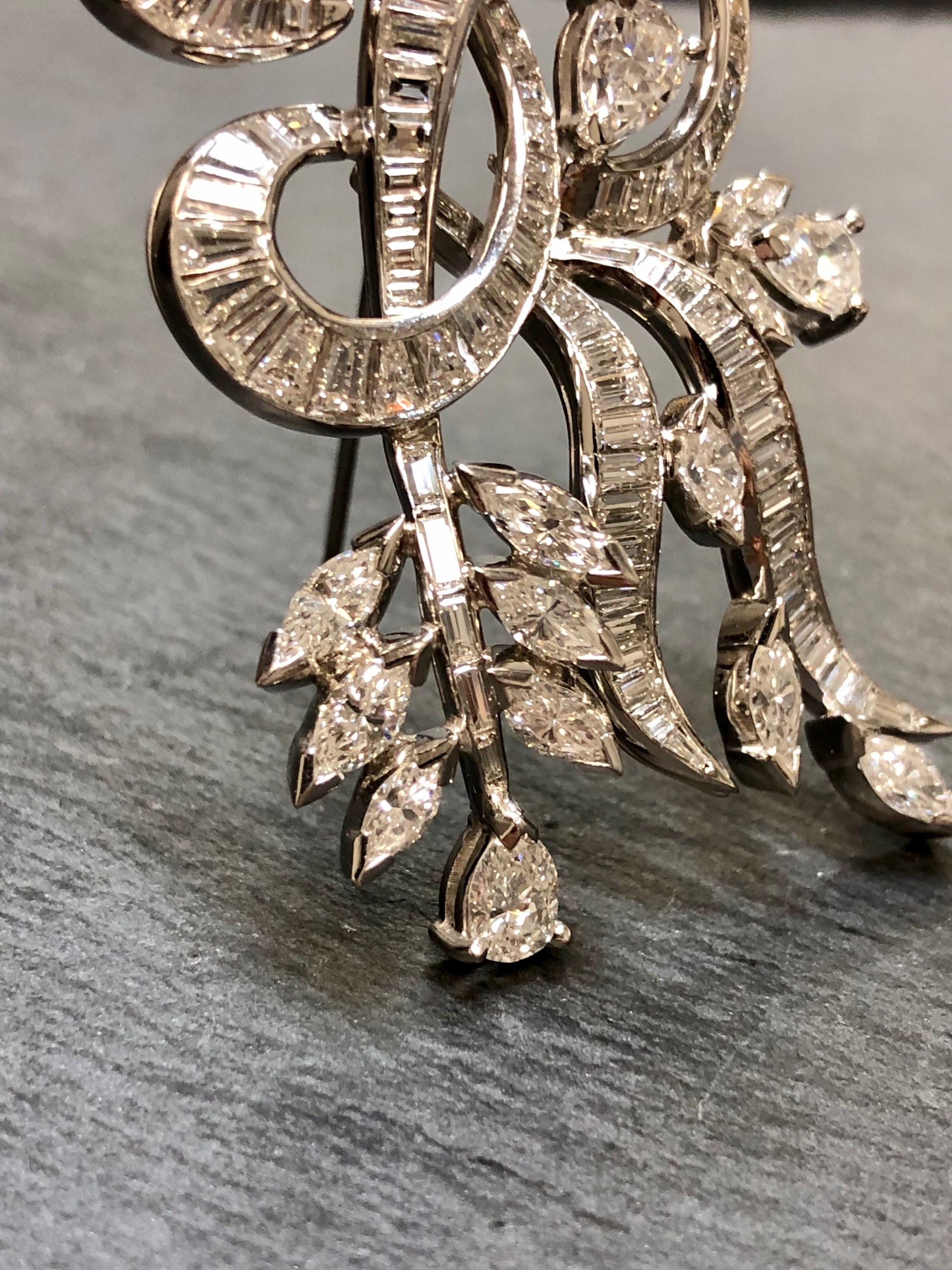 Gorgeous vintage circa 1950’s brooch done in platinum and set with approximately 8cttw in G-I Vs clarity baguette, marquise and large pear shape diamonds.

Dimensions/Weight
1 3/4” long by 1 1/4” wide. Weighs 11.1dwt.

Condition
All stones are