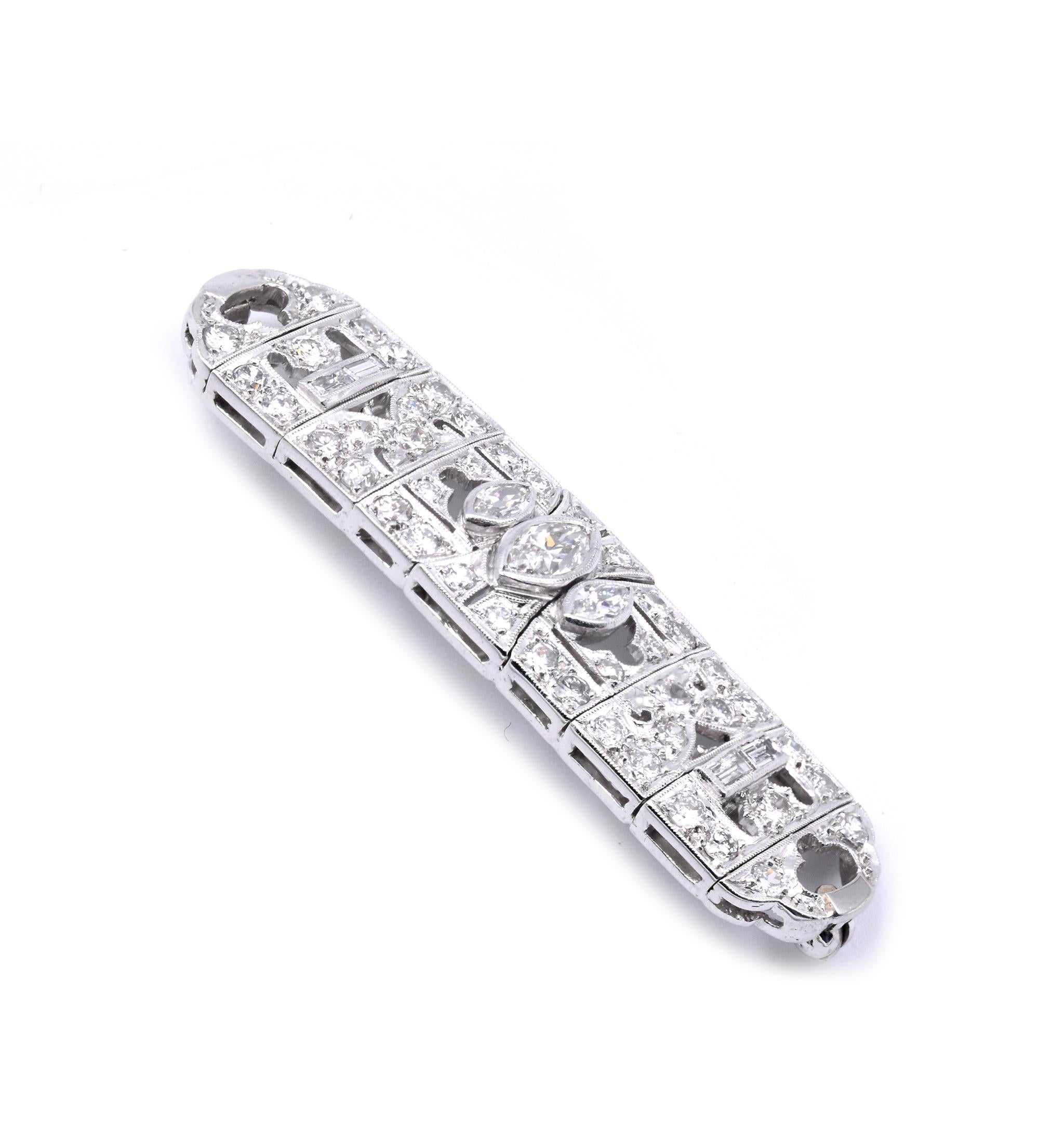 Designer: custom
Material: Platinum
Diamond: 3 marquise cut = .63cttw 
Diamond: 2 baguette cut = .12cttw
Diamond: 44 round cut = 2.20cttw
Dimensions: pin is approximately 51mm X 12.85mm
Weight: 13. grams
