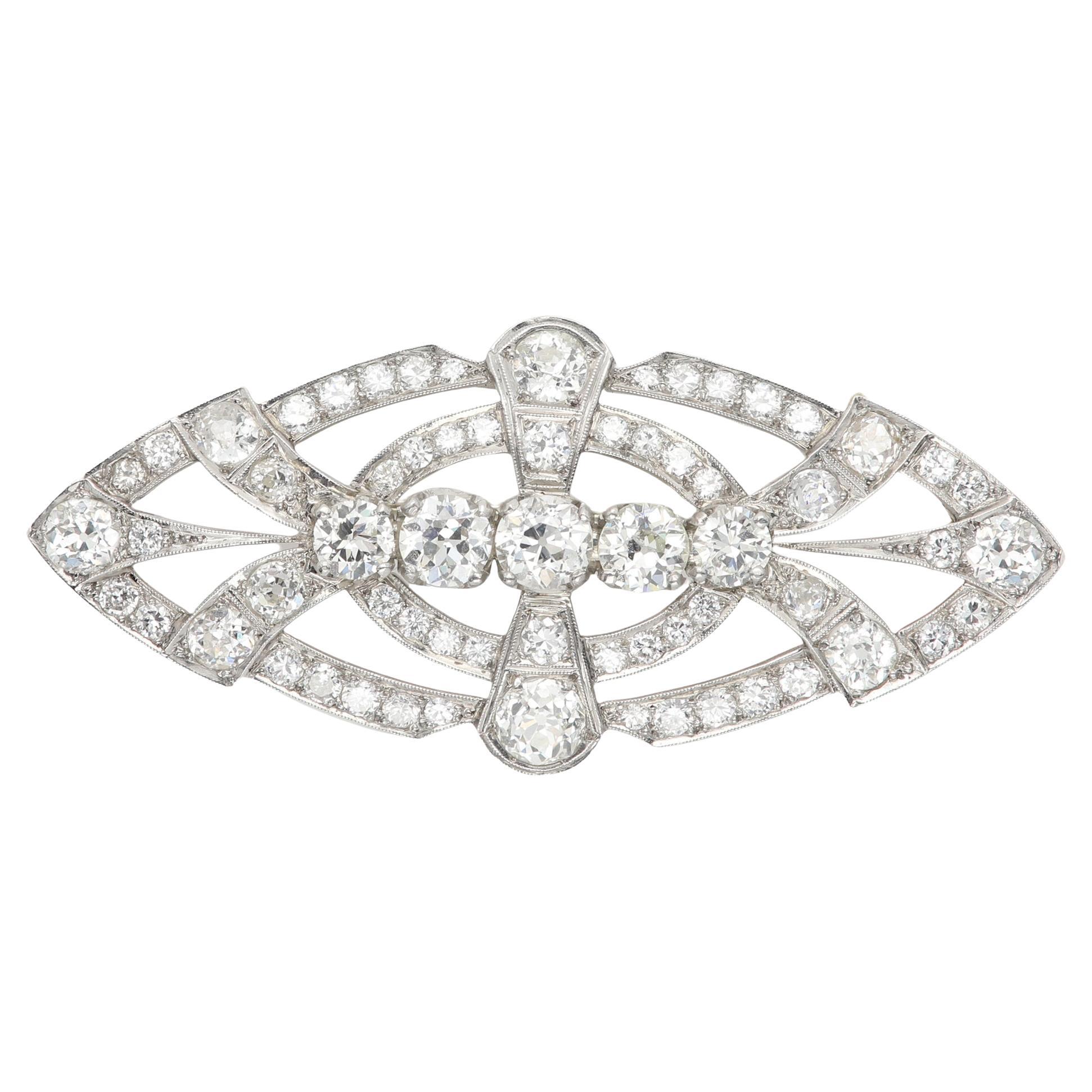 Vintage Platinum Diamond Brooch Pin: Fancy Estate Jewelry, circa 1950
s
