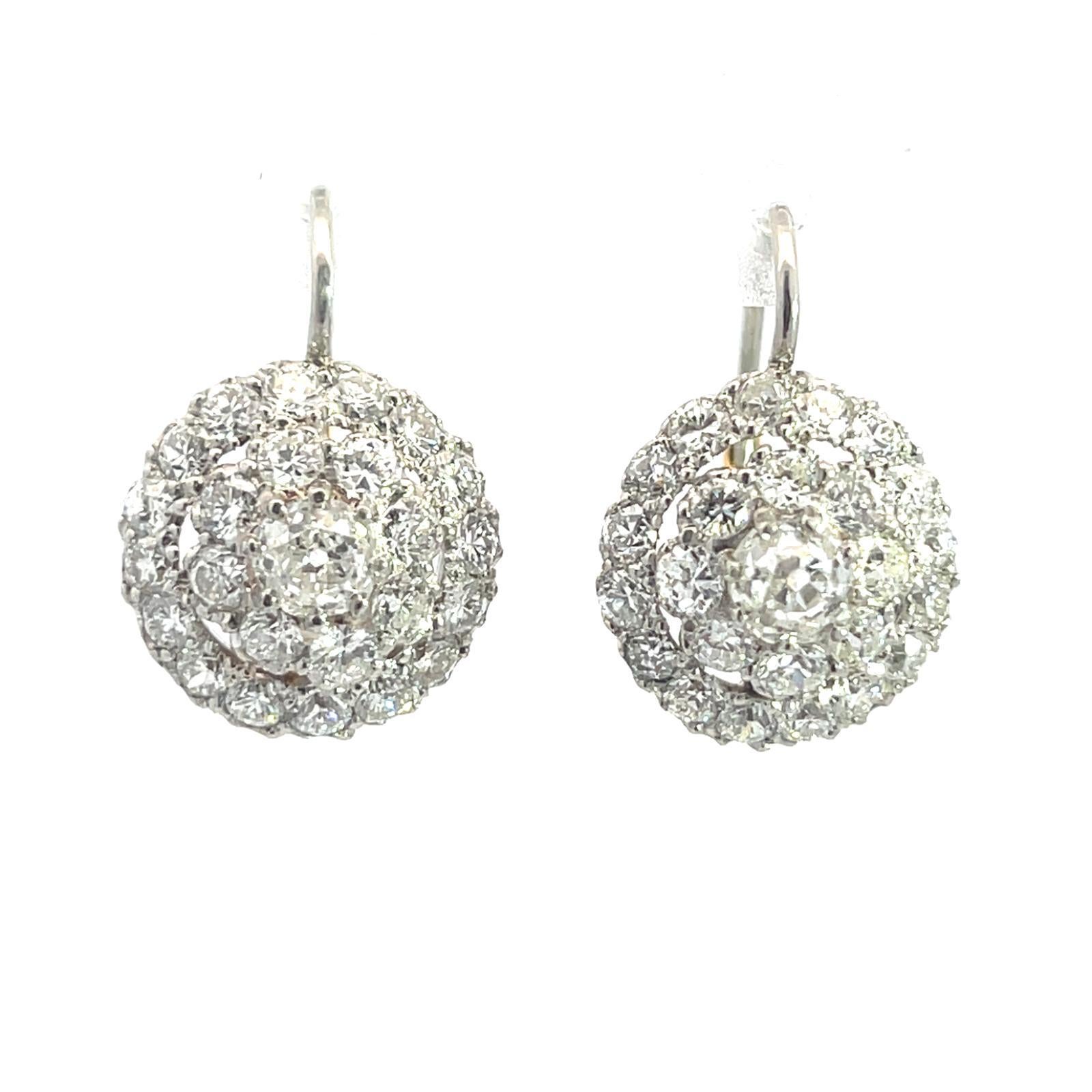 Atemberaubende Vintage Platinum Diamond Cluster Ohrringe

Platin Gewicht: 6,6g
Alte Mine Diamanten ca.: 1,20ct
Abmessungen 0.79in x 0.55in
