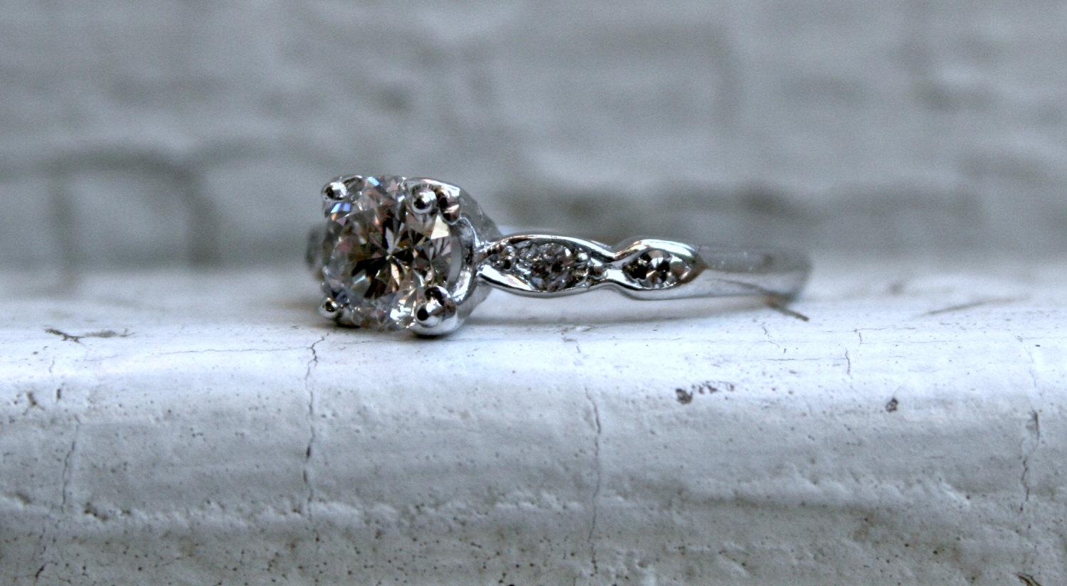 Art Deco Vintage Platinum Diamond Engagement Ring, 0.76 Carat For Sale