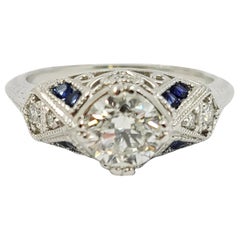 Vintage Platinum Diamond Engagement Ring with Sapphire Accents