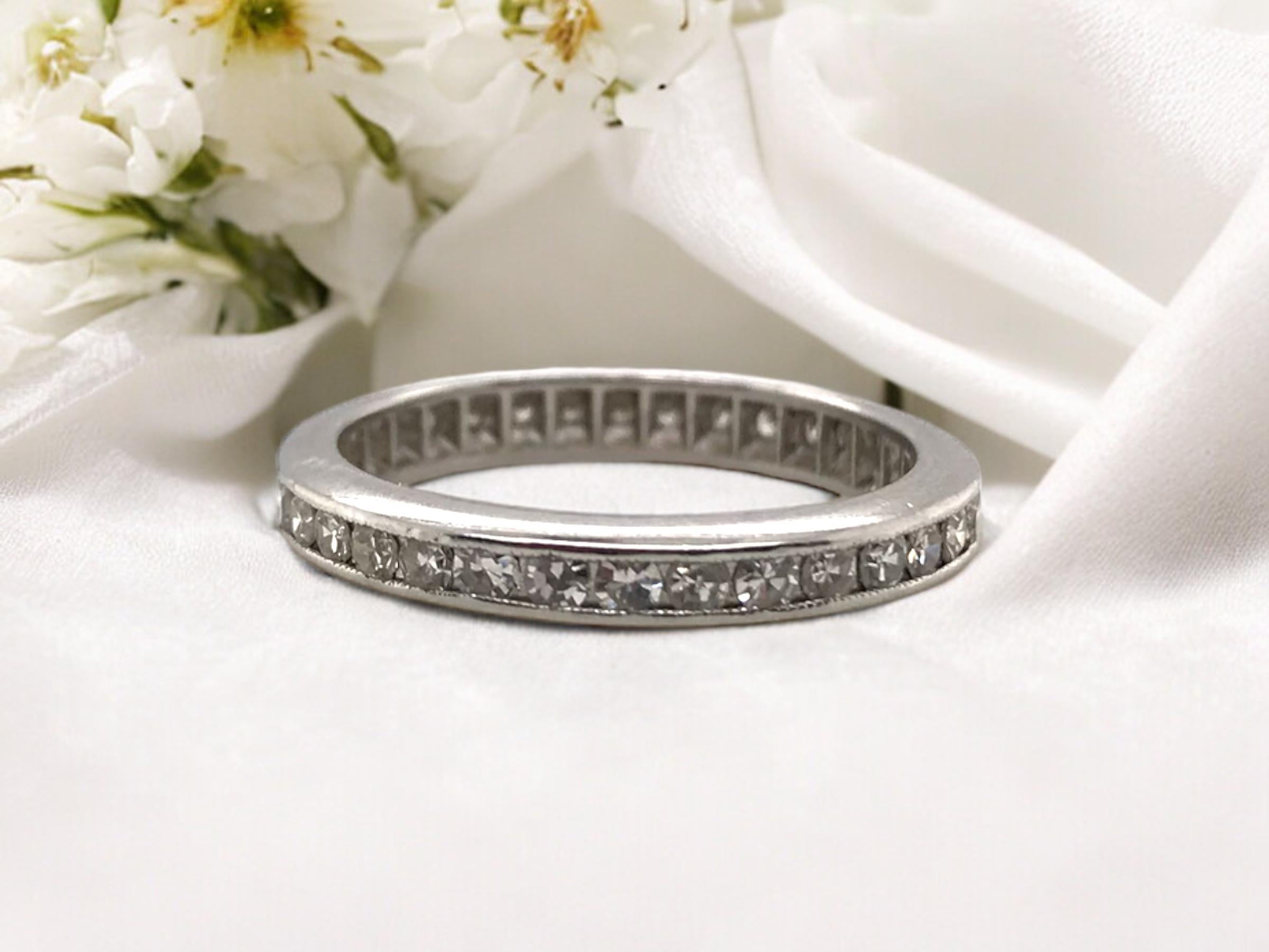 Such a classic piece!
This band is sure to go with any stack.

Ring Details
Material: Platinum
Era: Art Deco 1910 - 1930
Weight:  3.7 Grams
Width: 2.8mm
Height: 1.75mm
Finger Size: 6
Unfortunately Eternity Bands Are Not Sizable

Accented by the