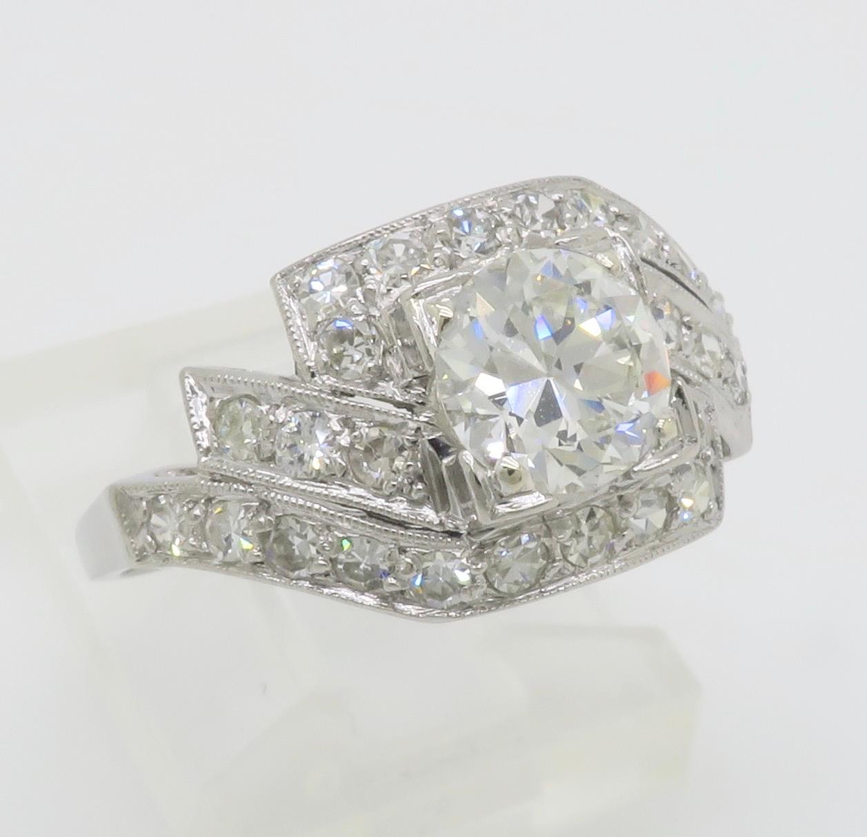 Bague vintage en platine avec 1,65 pce de diamants extraits de la terre en vente 11