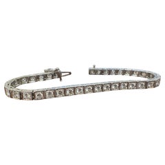 Bracelet tennis vintage en platine avec diamants 4 carats
