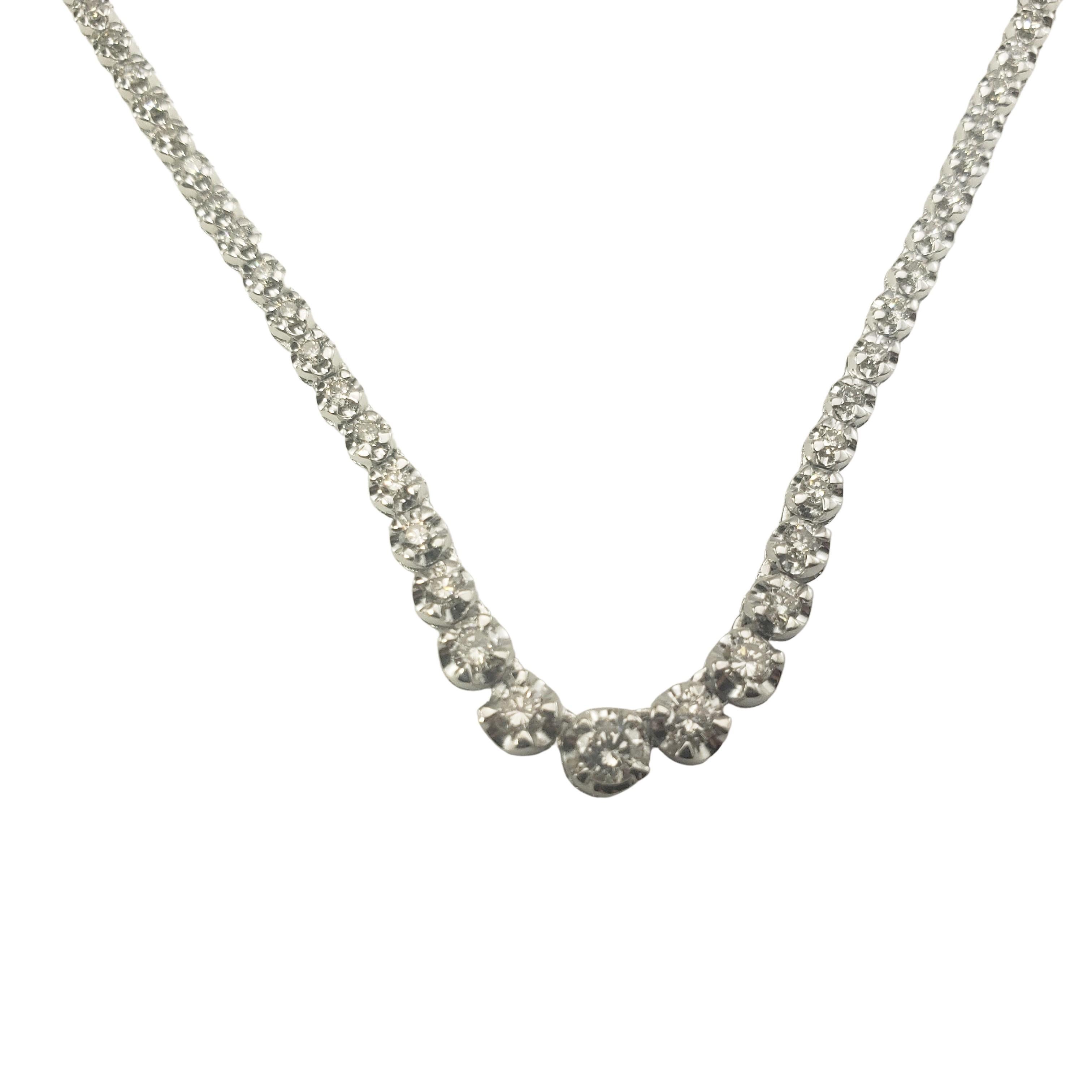 Vintage Platinum and Diamond Tennis Necklace-

This spectacular tennis necklace features 137 round brilliant cut diamonds set in classic platinum.

Approximate total diamond weight:  3 ct.

Diamond color: J-M

Diamond clarity:  SI1-I1

Size:  16.5