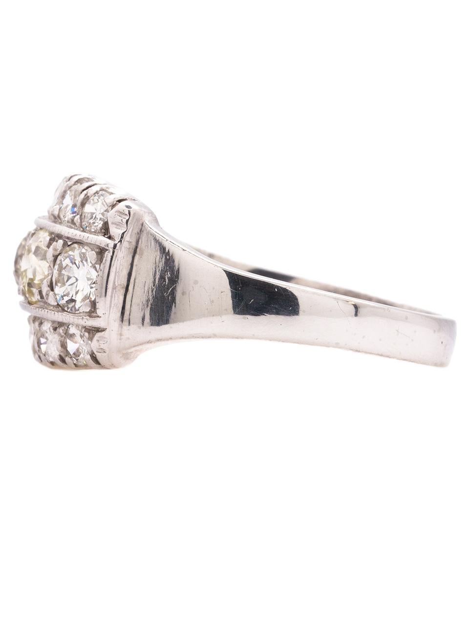 Antique platinum diamond band set with three rows of white & shining old European cut diamonds, approximately 1.50ct total weight, with color grades ranging from G-L, SI1-I3 clarity. 10mm wide, ring size is 6.75 with ability to adjust. Circa