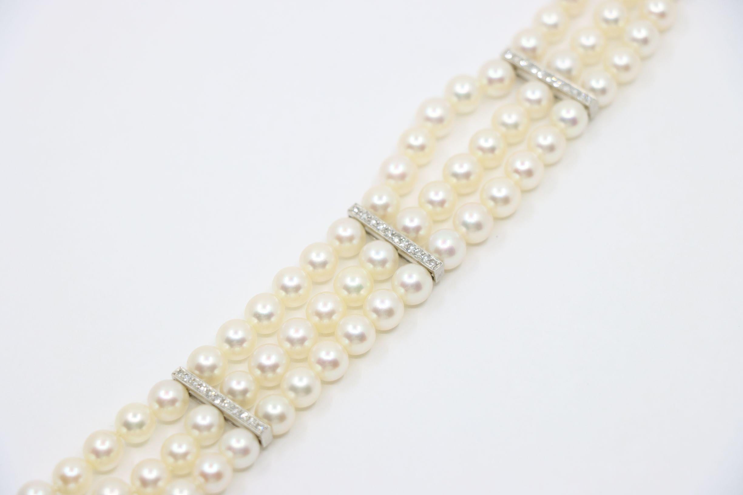Bracciale vintage in platino e diamanti con onde di perle a più fili in vendita 1