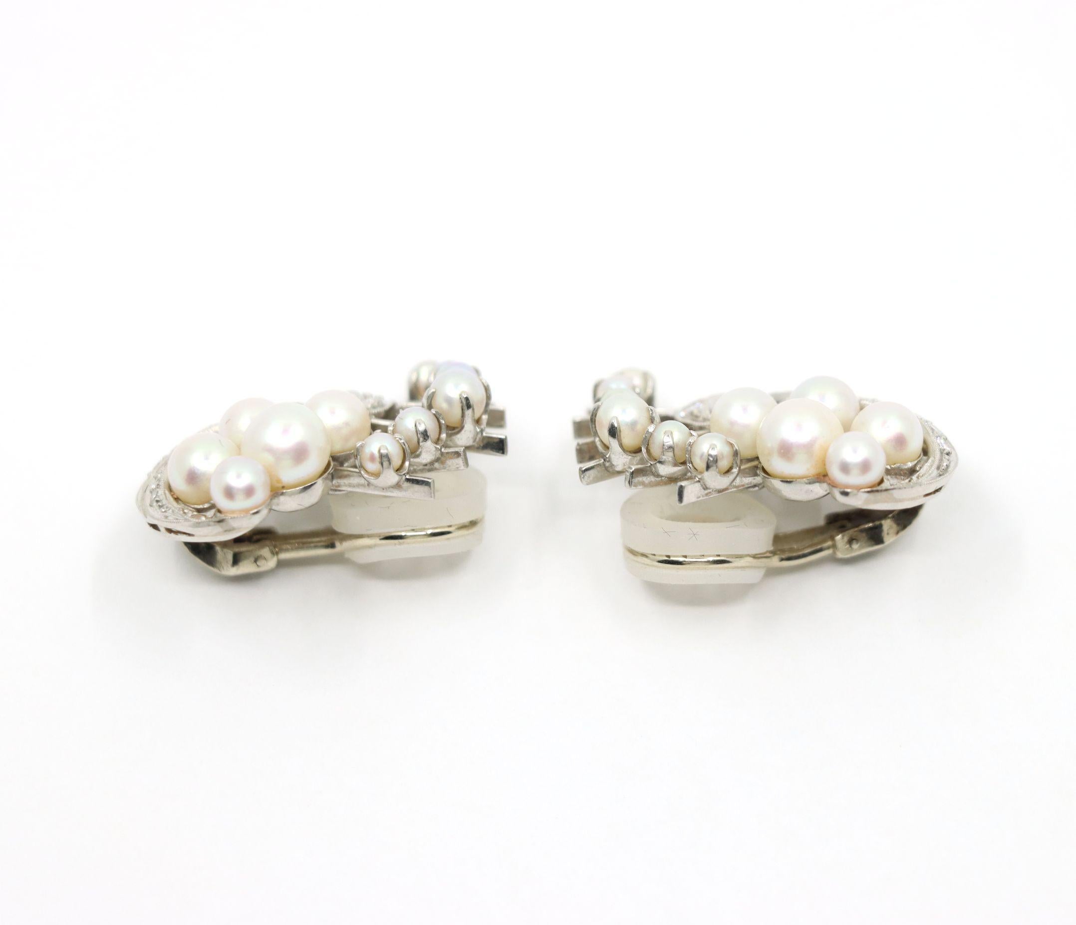 Pendientes vintage de platino y diamantes Olas de perlas en venta 1